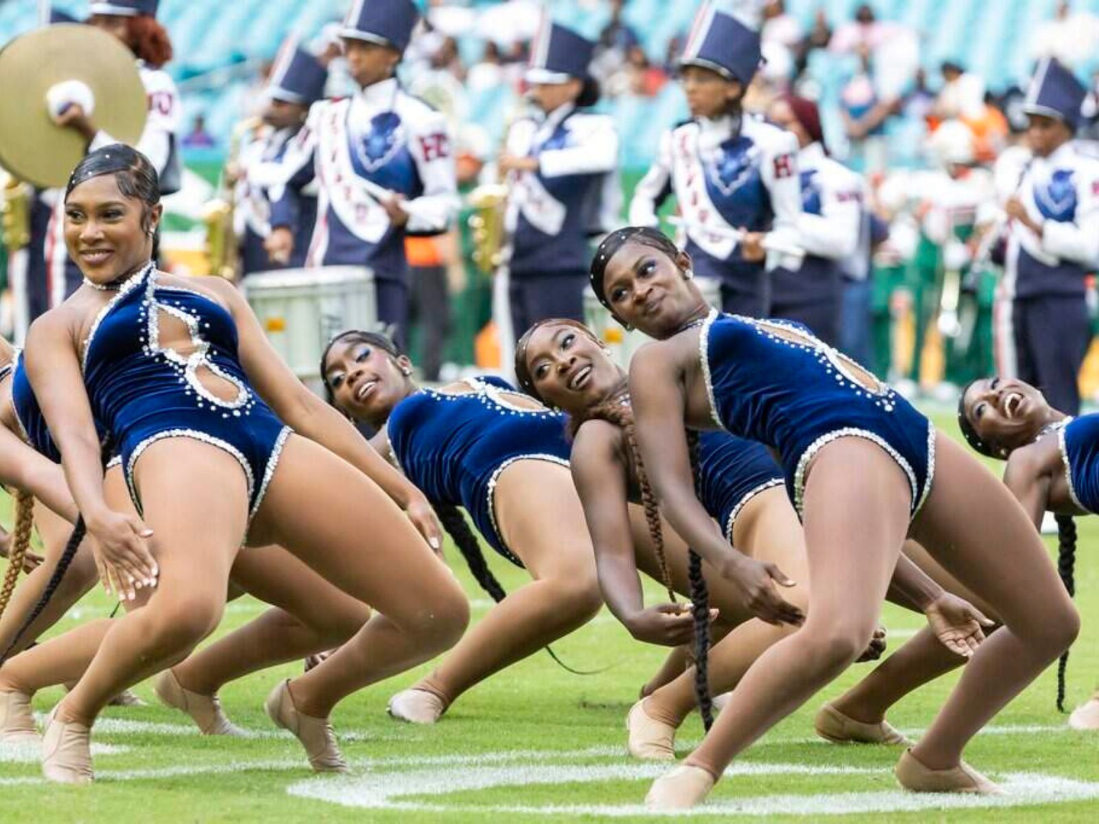 Women enjoying a lively Orange Blossom Classic weekend experience in Miami