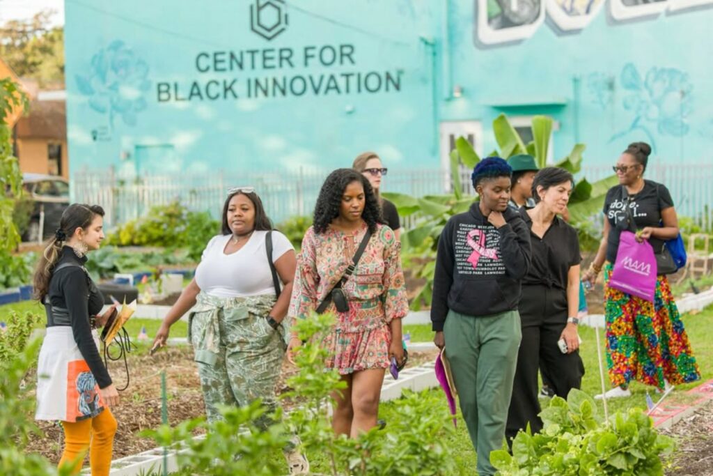 Visitors exploring historic Overtown architecture and Black Miami cultural landmarks