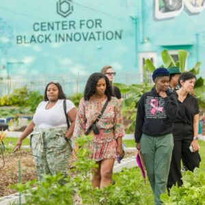 Visitors exploring historic Overtown architecture and Black Miami cultural landmarks